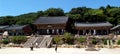 Visitors in the central square of the Beomeosa Buddhist temple complex climb the stairs. Busan, Korea Royalty Free Stock Photo