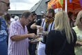 Visitors enjoy a plate of oysters at the Whitstable Oyster Festival