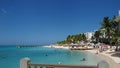 Visitors Enjoying the White Sandy Beach and Clear Blue Water at Montego Bay Beach, Jamaica Royalty Free Stock Photo