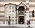 Visitors enter Duomo Cattedrale di S. Maria Matricolare cathedral, Verona Royalty Free Stock Photo