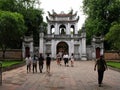 Visitors enter and exit through the main gate of the Temple of Literature. Hanoi