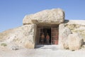 Visitors at entrance to Dolmen of Menga in Antequera, Spain