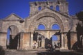 Visitors explore the ruins of St Simeon