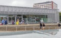 Visitors in front of the main entrance to the Topography of Terror, an outdoor and indoor History Museum in Berlin, Germany. Royalty Free Stock Photo