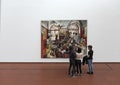 Visitors in front of a picture in the Museum Ludwig, Cologne, Germany