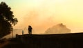 Visitors going walks on the big fort large wall at vellore fort with sunset