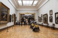 Visitors in the hall of the famous Russian artist Ilya Repin in the Tretyakov gallery, Moscow