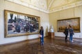 Visitors in the hall of the Russian artist Konstantin Savitsky and Grigory Myasoedovn in the Russian Museum, St. Petersburg