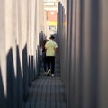 Visitors at the Holocaust Memorial in Berlin Royalty Free Stock Photo