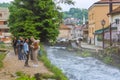 Visitors at the Iconic Blue Water Spring in Travnik, Bosnia and Herzegovina