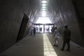 Visitors leaving the darkness of the Yad Vashem museum in Jerusalem Israel and moving into the bright light of day. Royalty Free Stock Photo