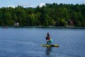 Visitors and locals enjoy summer day on Mirror Lake in Lake Placid, New York State Royalty Free Stock Photo