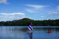 Visitors and locals enjoy summer day on Mirror Lake in Lake Placid, New York State Royalty Free Stock Photo
