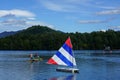 Visitors and locals enjoy summer day on Mirror Lake in Lake Placid, New York State Royalty Free Stock Photo