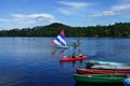 Visitors and locals enjoy summer day on Mirror Lake in Lake Placid, New York State Royalty Free Stock Photo