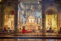 Visitors looking at the church's interior Chiesa di Ognissanti in Florence, Italy