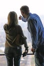 Visitors looking out o fthe former Hancock Tower in Chicago, Illinois