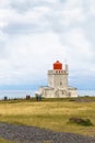 Visitors near Dyrholaeyjarviti Lighthouse