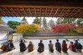 Visitors observe Ryoanji`s famous rock garden from the Hojo building.An aristocrat`s villa during Heian Period Royalty Free Stock Photo