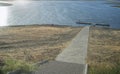 Visitors over reservoir pontoon