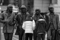 Visitors pay homage to the Beatles statue at the Liverpool Waterfront