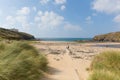 Visitors on Poldhu beach Cornwall England UK on the Lizard Peninsula between Mullion and Porthleven Royalty Free Stock Photo