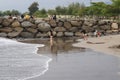 Visitors waiting for the sunset on the beach in the city of Padang, West Sumatra, May 21, 2022