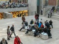 Visitors rest on modern art benches in the atrium of the Rijksmuseum, Amsterdam