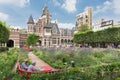 Visitors resting in a garden at the zoo of Antwerp