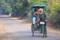 Visitors riding cycle rickshaw in Keoladeo Ghana National Park i Royalty Free Stock Photo