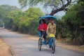 Visitors riding cycle rickshaw in Keoladeo Ghana National Park i Royalty Free Stock Photo