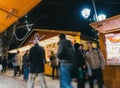 Visitors shopping happy admiring Christmas Market Royalty Free Stock Photo