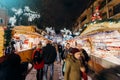 Visitors shopping happy admiring Christmas Market Royalty Free Stock Photo