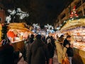 Visitors shopping happy admiring Christmas Market Royalty Free Stock Photo