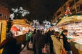 Visitors shopping happy admiring Christmas Market Royalty Free Stock Photo