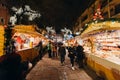 Visitors shopping happy admiring Christmas Market Royalty Free Stock Photo