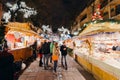 Visitors shopping happy admiring Christmas Market Royalty Free Stock Photo