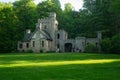 Visitors at Squires Castle in late afternoon shade