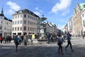 Visitors at stokes fountain on amager torv in Copenhagen