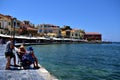 Visitors taking a break on Chania harbour