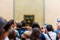 Visitors taking photo of Mona Lisa Mona Lisa by Leonardo Da Vince  at the Louvre Museum, Paris, France Royalty Free Stock Photo
