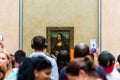 Visitors taking photo of Mona Lisa Mona Lisa by Leonardo Da Vince  at the Louvre Museum, Paris, France Royalty Free Stock Photo