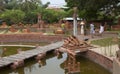 Visitors taking a tour at Thanh Ha Earthenware Museum and watching models of most well known architectures in the world