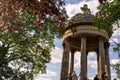 Visitors at the temple of the Sybil in Buttes Chaumont Park, Paris Royalty Free Stock Photo