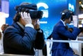 Visitors test VR headsets at MWC19 in Barcelona