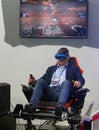 Visitors testing VR devices experiences in MWC 2019 vertical Royalty Free Stock Photo