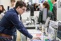 Visitors to the exhibition visiting the equipment and exhibits Royalty Free Stock Photo