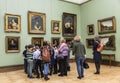 Visitors to the hall of famous Russian painter Orest Kiprensky in the Tretyakov gallery, Moscow Royalty Free Stock Photo