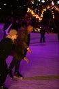 Local Kyivans and tourists visit the public space of the Roshen Chocolate Factory decorated with Christmas lights in Kyiv, Ukraine