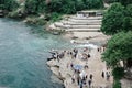 Visitors and Tourists at the Neretva River Access in Mostar, Bosnia Herzegovina